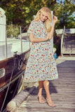 tailliertes midikleid mit blumendruck, klassischer blusenkragen mit leiste,  kurze aermel, gezuegelter rock mit volantstufen, seitliche eingriffstaschen, kampagne, wallmann